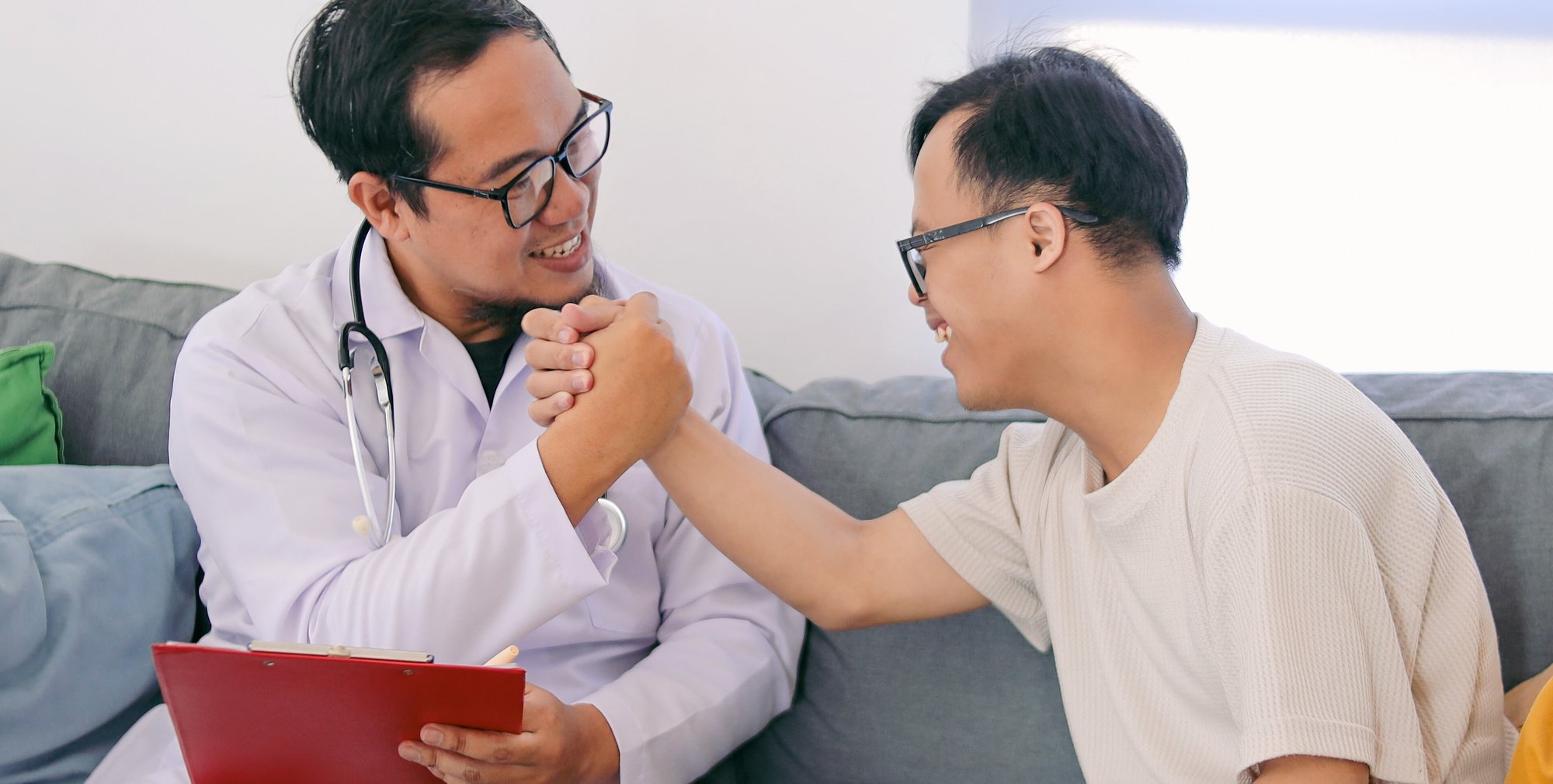 man with I/DD and health care provider