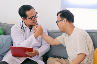 man with i/DD and health care professional