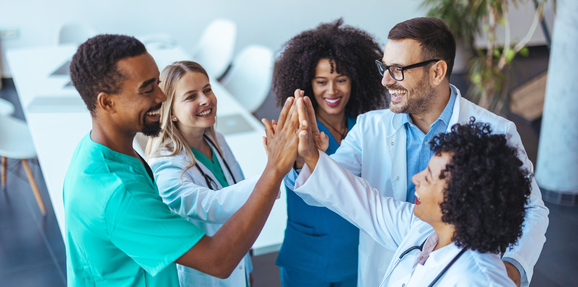 health care providers high fiving